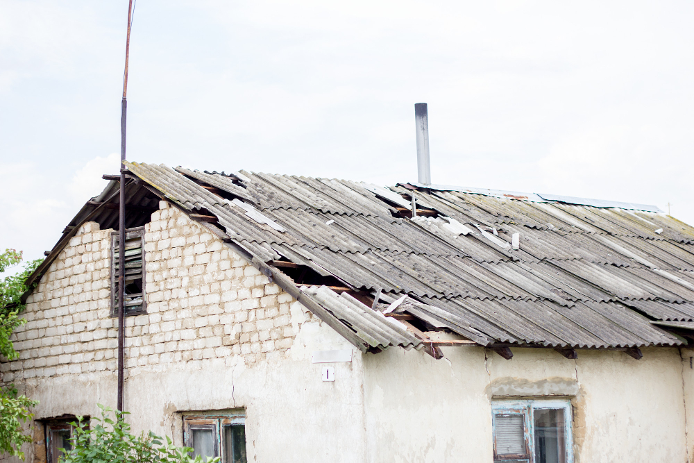 Understanding and Navigating Roof Damage Insurance Claims
